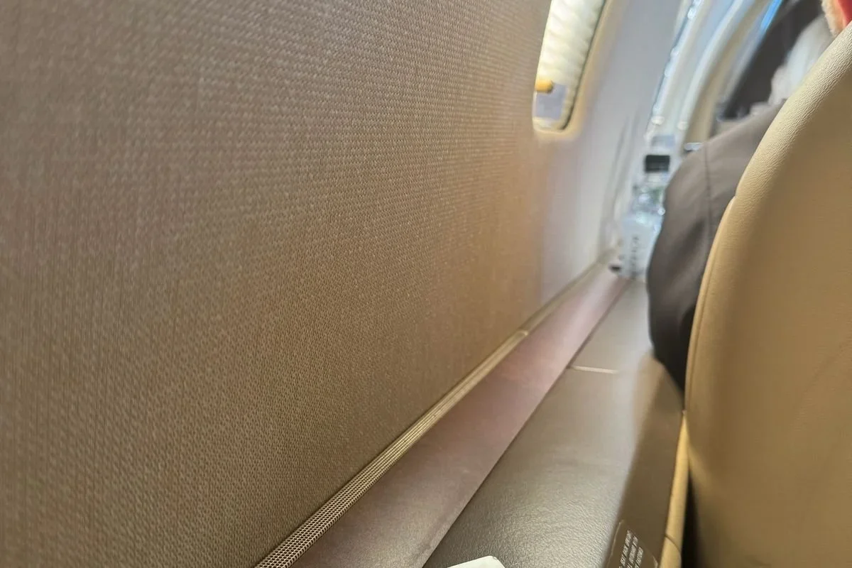 Columbia Southern University trustee badge with Chantell Cooley name on an airplane seat, the result of choosing to pay the price to move forward